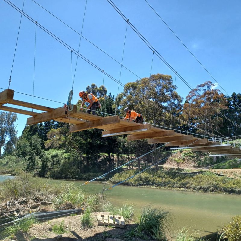 Matt Thom and team building another amazing bridge in the NZ outdoors.