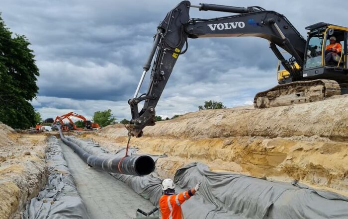 A reject chipseal was tested and approved for use as bedding and surround for pipes on the Peacocke Northern Transfer Mains project.